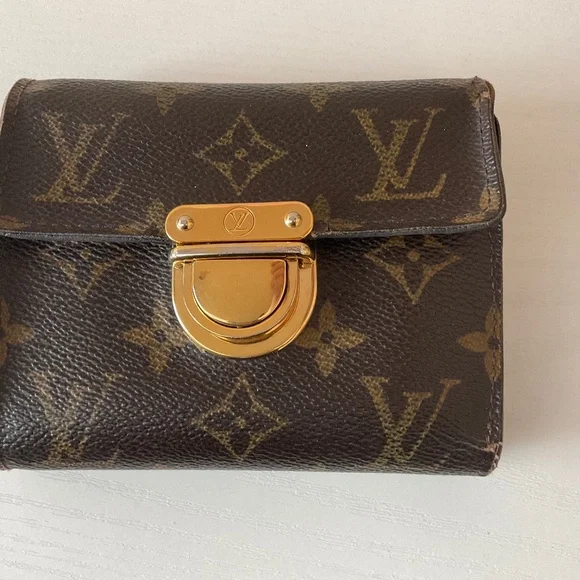 Louis Vuitton Wallet with gold bucket closure - Picture 1 of 8